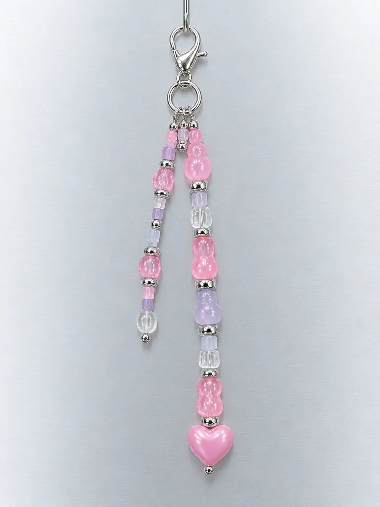 Bubble Pixel Cluster Charm hanging from its clasp