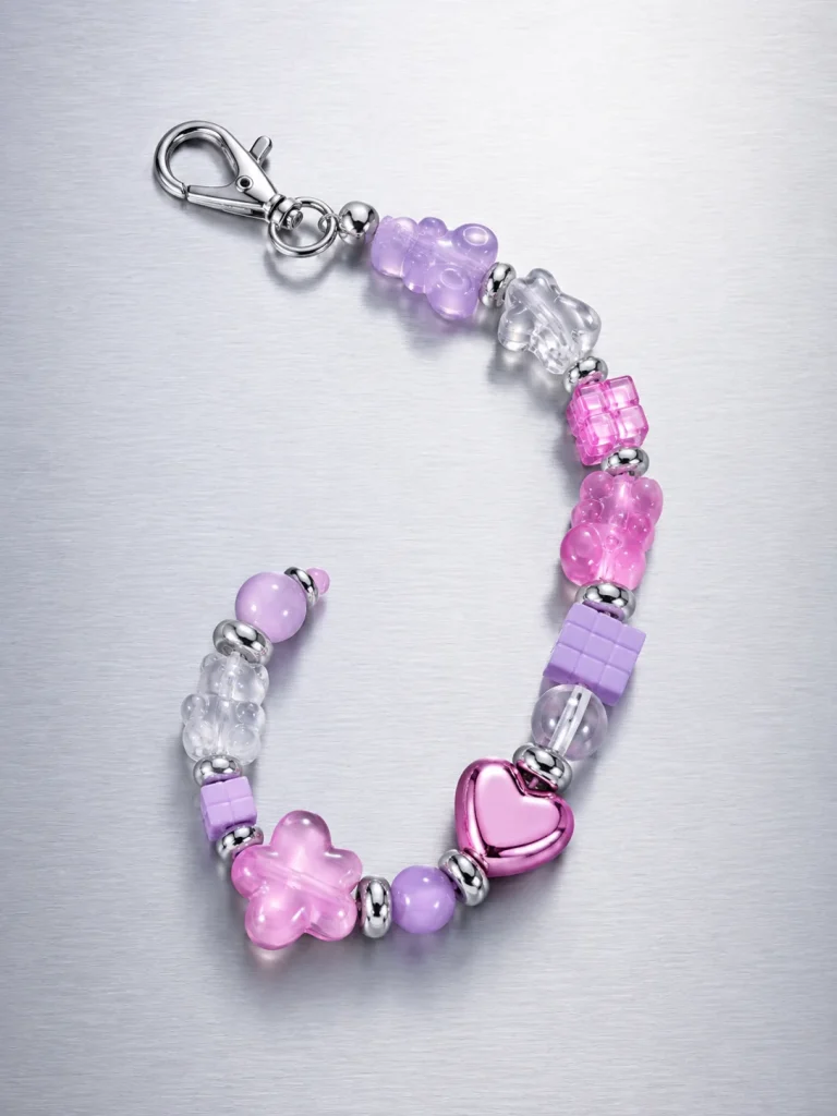 Bubble Pixel Earbud Case Charm, laid flat