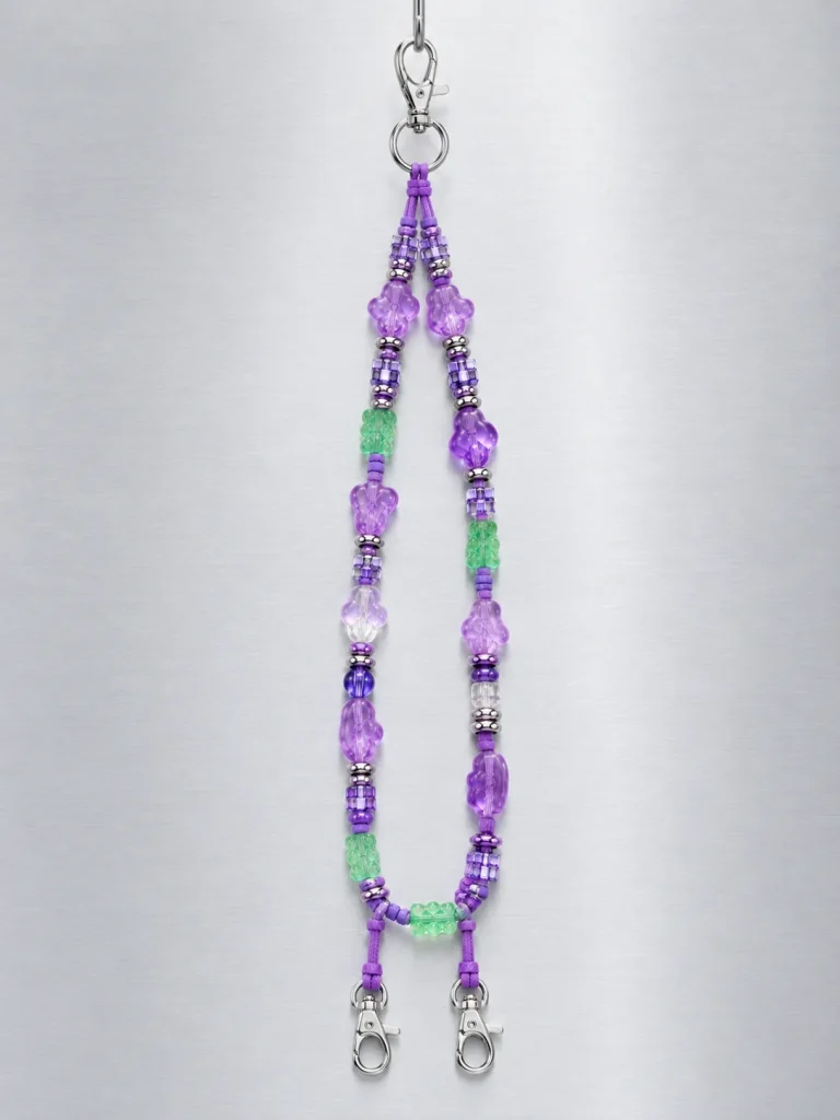 Grape Soda Crossbody Lanyard hanging from its clasp
