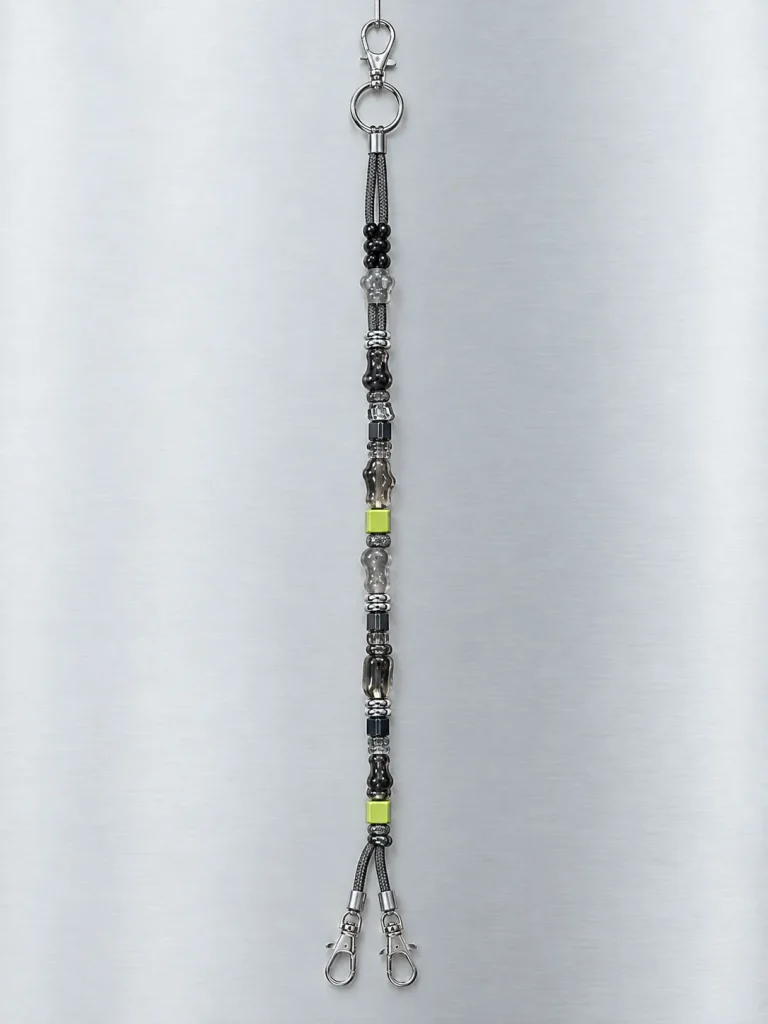 Night Mode Crossbody Lanyard hanging from its clasp