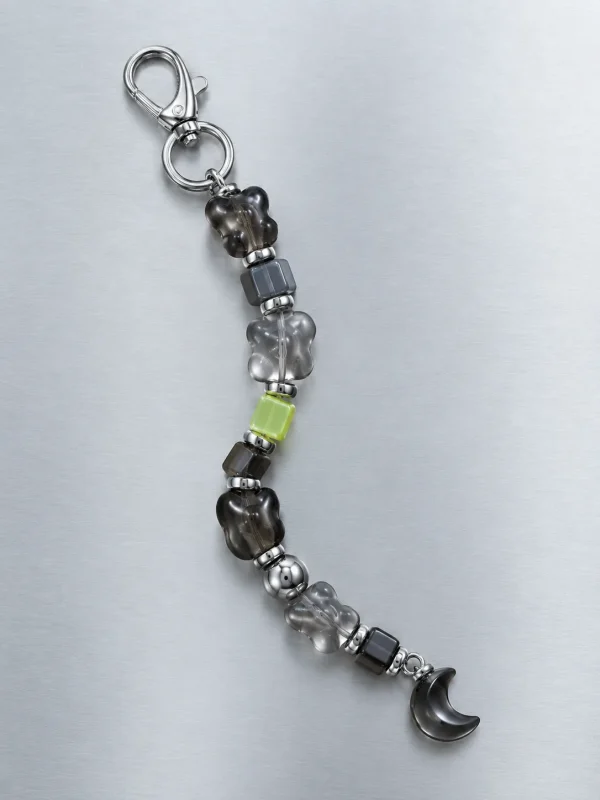 Night Mode Earbud Case Charm, laid flat