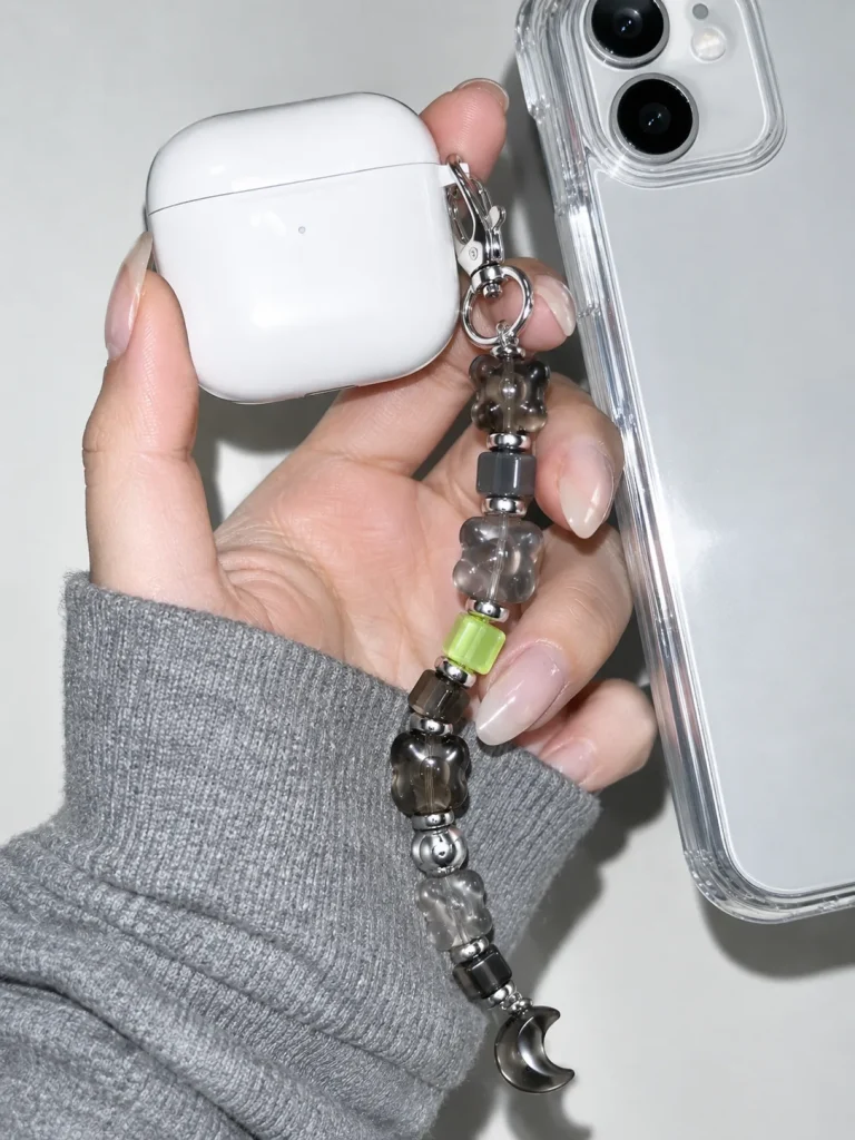 Night Mode Earbud Case Charm worn or in use