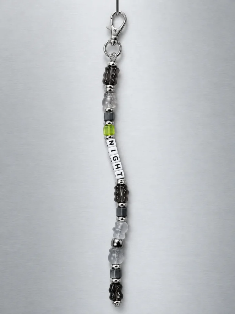Night Mode Pixel Strand hanging from its clasp