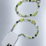 Slime Signal Crossbody-Handykette, flach ausgelegt