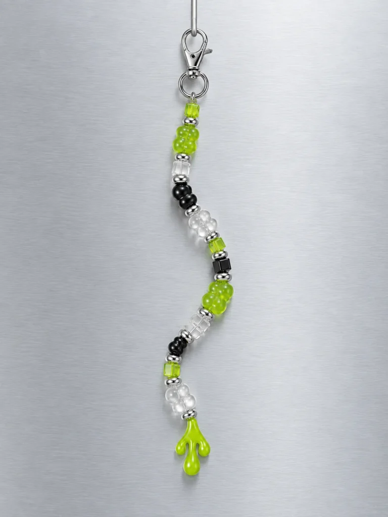 Slime Signal Drop Charm hanging from its clasp