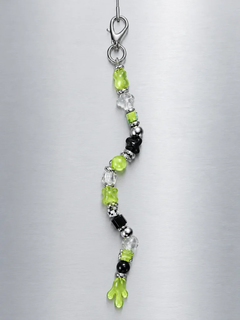 Slime Signal Earbud Case Charm hanging from its clasp