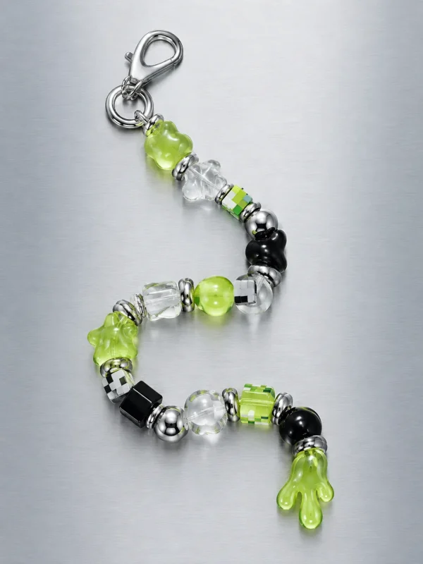 Slime Signal Earbud Case Charm, laid flat