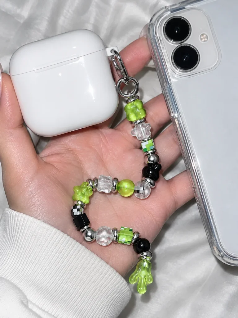 Slime Signal Earbud Case Charm worn or in use