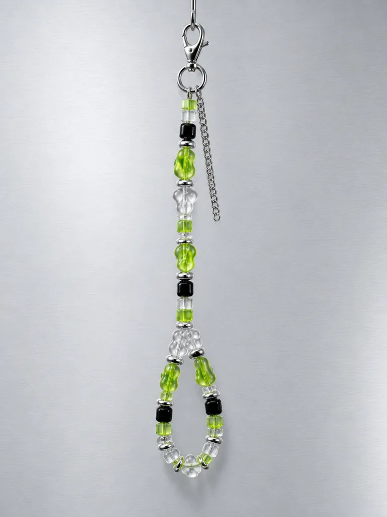 Slime Signal Short Lanyard hanging from its clasp