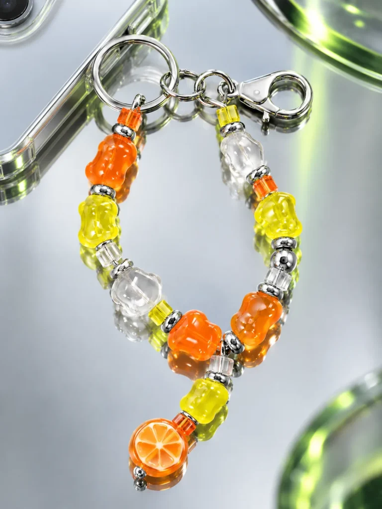 Tangerine Glitch Bag Dangle close up