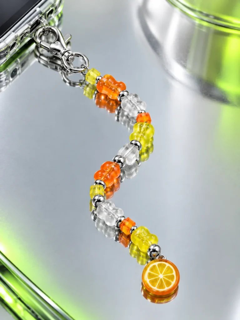 Tangerine Glitch Drop Charm close up