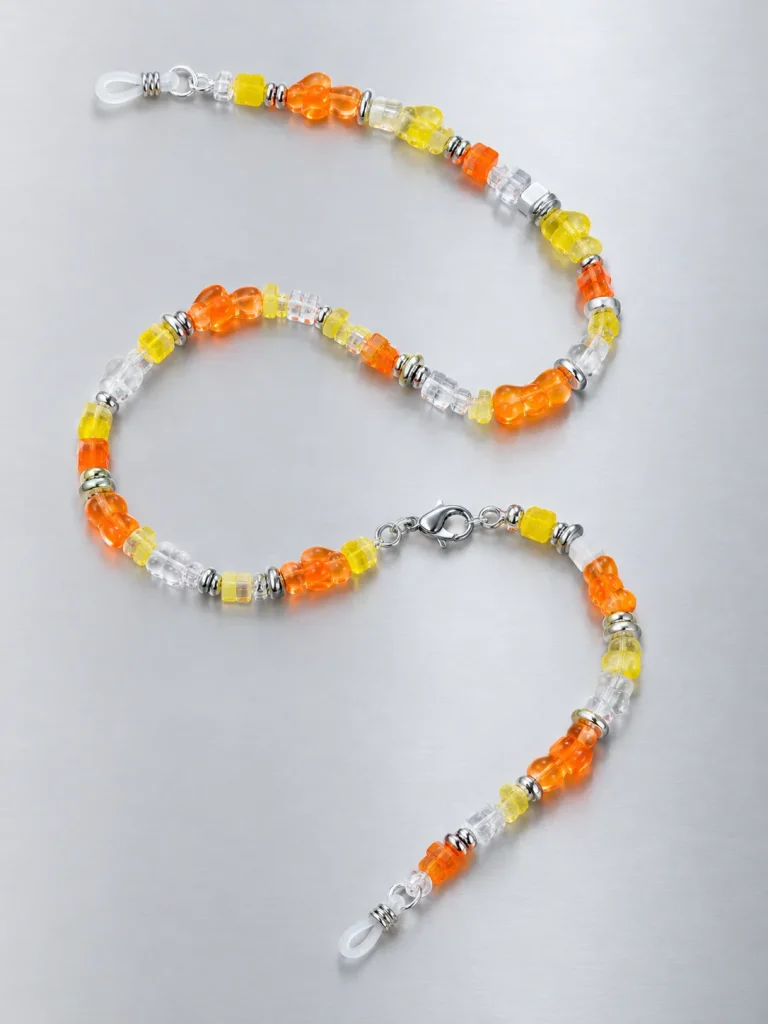 Tangerine Glitch Glasses Chain, laid flat